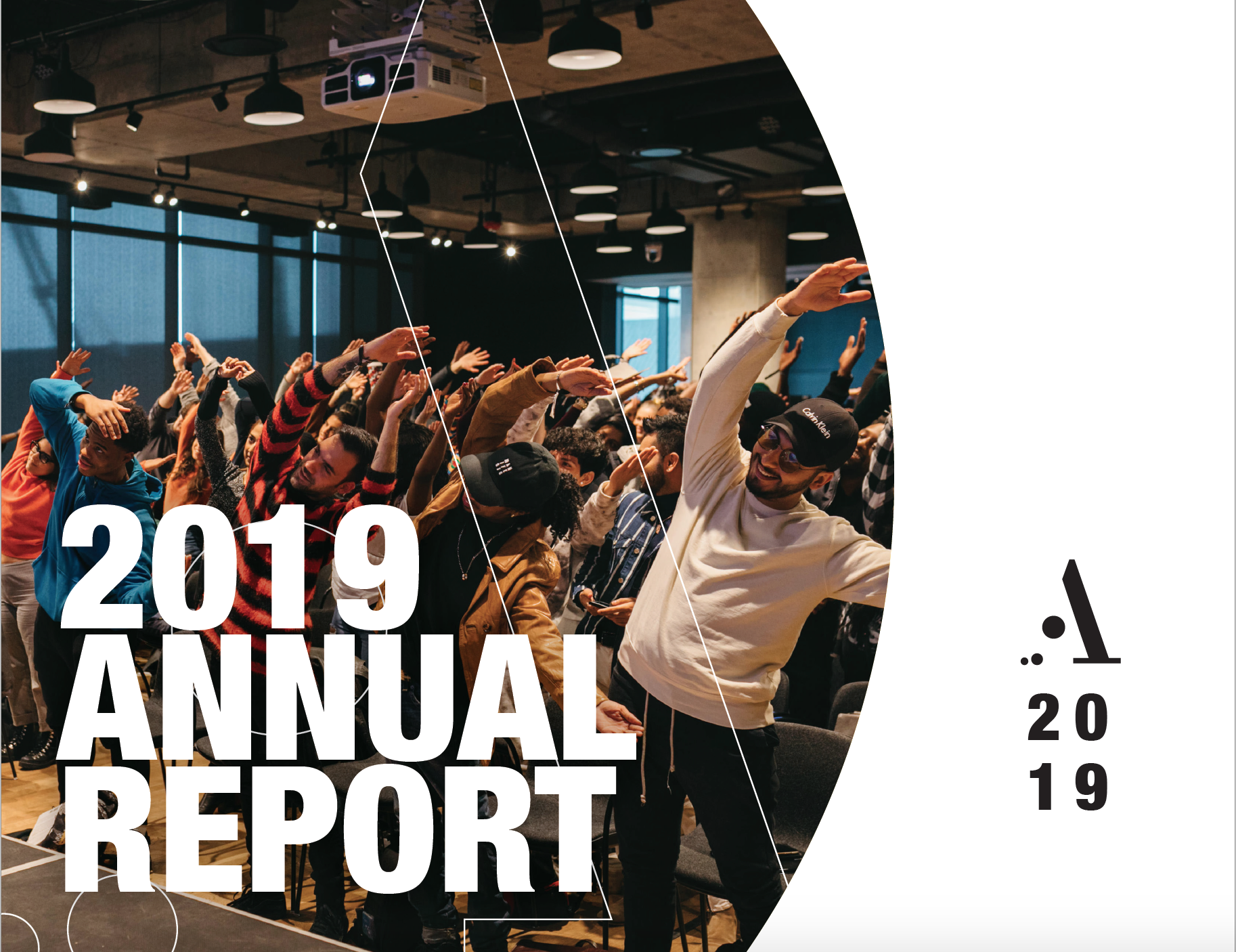 Group of people in a room doing standing stretches in unison. Text overlay on bottom left reads “2019 ANNUAL REPORT” in white block text. Right side of image: white background, Artscape logo/”2019” on bottom right in black.